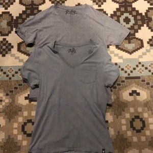 Two men’s V-neck T-shirts